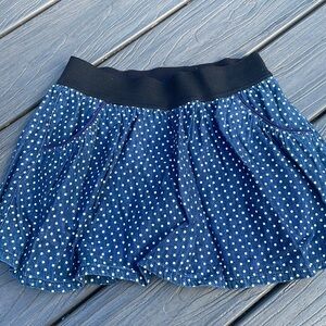 Justice Skirt w pockets and built in shorts.  Size 14.  Great condition